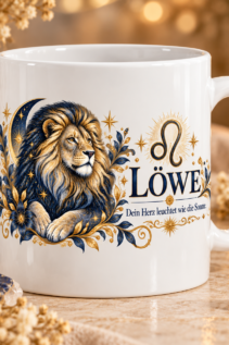Weiße Tasse mit Sternzeichen-Motiv Löwe und dem Spruch „Dein Herz leuchtet wie die Sonne.“