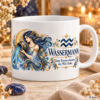 Weiße Tasse mit Sternzeichen-Motiv Wassermann und dem Spruch „Deine Träume schenken der Welt Farbe.“